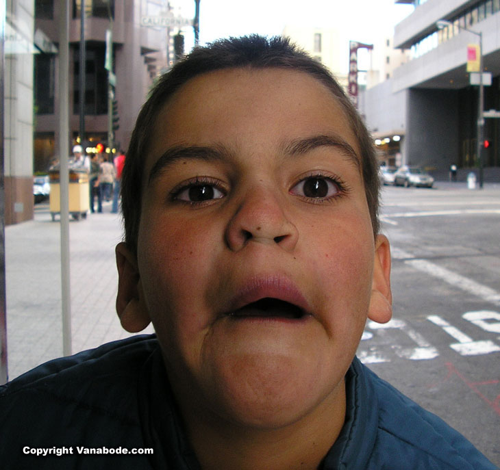 picture of ben's goofy face in a big city