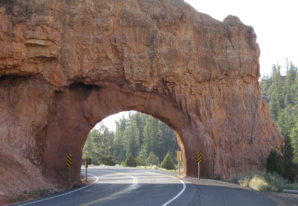 picture of cut out in rock over highway getting to bryce canyon