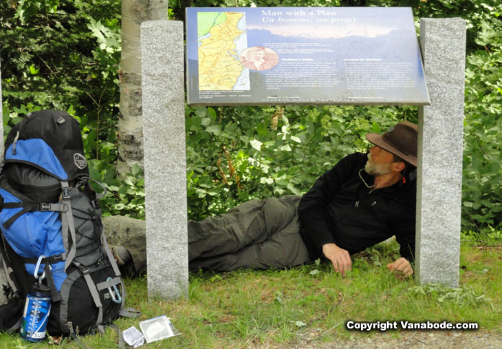 grafton notch mountain hiker tired on ground