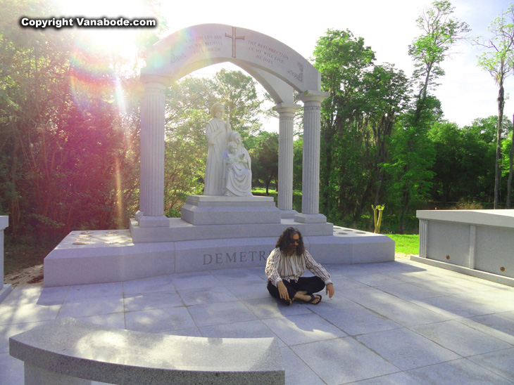 Vanabode author Jason Odom posing meditation style in Oak Lawn Cemetary